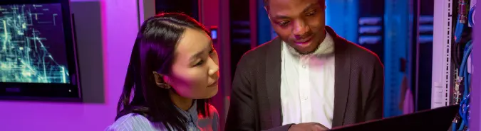 Two professionals reviewing network configurations, showcasing Exigo Tech's Azure WAN services in Australia for secure connectivity and unified branch office networking Two professionals reviewing network configurations, showcasing Exigo Tech's Azure WAN services in Australia for secure connectivity and unified branch office networking