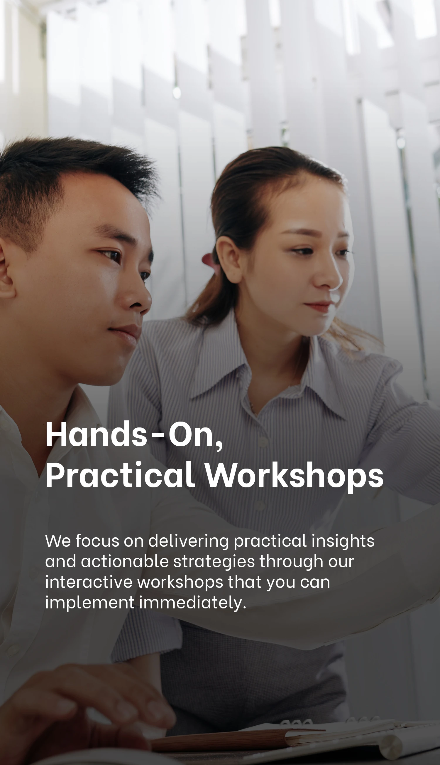 Exigo Tech emphasizes hands-on, practical workshops, showcasing a facilitator engaging with a participant, highlighting the delivery of actionable strategies for immediate implementation. Exigo Tech emphasizes hands-on, practical workshops, showcasing a facilitator engaging with a participant, highlighting the delivery of actionable strategies for immediate implementation.