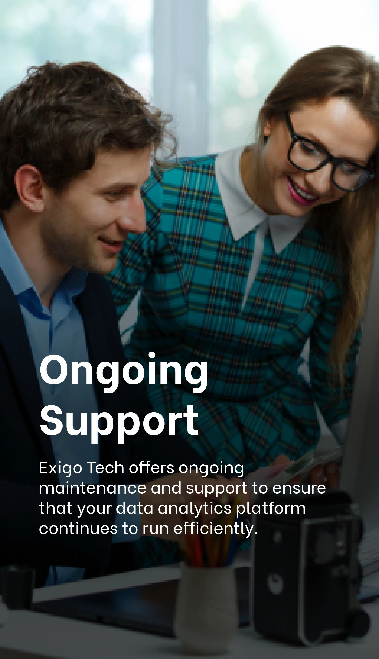 Subject that matter | Professionals working together, showcasing Exigo Tech's ongoing support for data analytics platforms