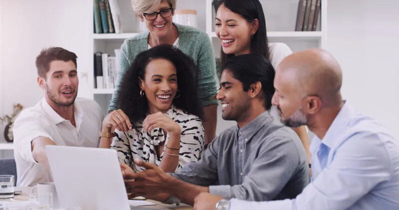 Exigo Tech Perks: A diverse team working together in an office, reflecting a multicultural and inclusive work environment. Exigo Tech Perks: A diverse team working together in an office, reflecting a multicultural and inclusive work environment.