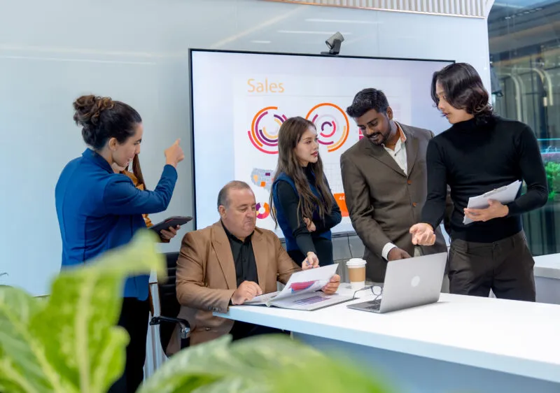 Exigo Tech Perks: Employees engaged in a professional training session, emphasizing learning and career growth. Exigo Tech Perks: Employees engaged in a professional training session, emphasizing learning and career growth.