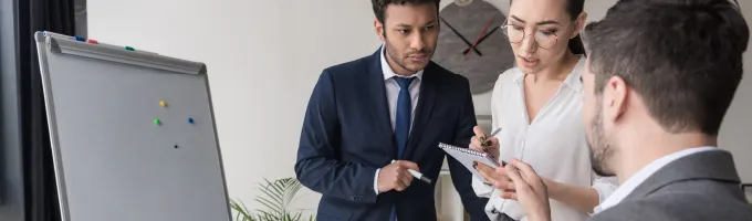 Business team conducting a needs analysis and current state assessment for ERP implementation Business team conducting a needs analysis and current state assessment for ERP implementation