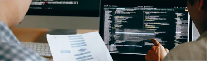 Developer reviewing cloud security code for Azure Arc optimization Developer reviewing cloud security code for Azure Arc optimization