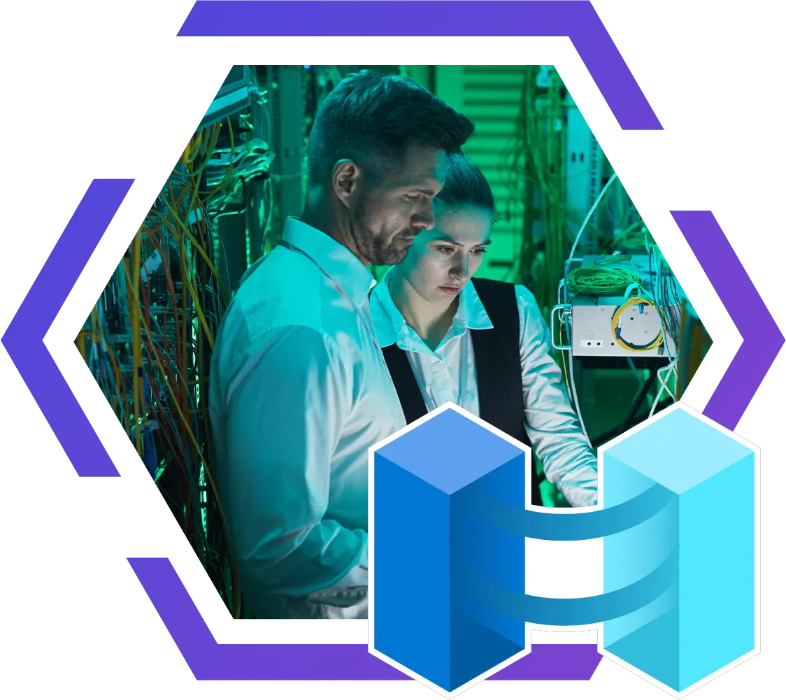 about-us-hex-azure-arc IT specialist managing cloud infrastructure using a laptop in a server room